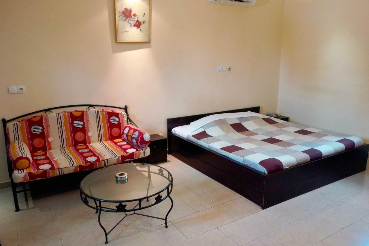 Petit Motel Beijing Abidjan Exterior foto